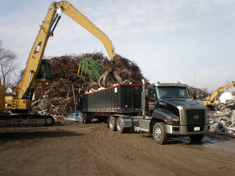 Petersen crane loading scrap into a truck